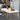Table basse avec structure en métal doré et plateau en faux marbre