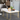 Table basse avec structure en métal doré et plateau en faux marbre