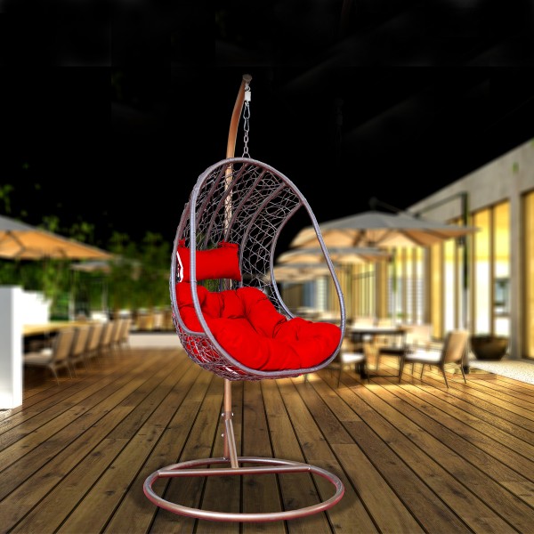 Hanging Egg Swing with red cushions and brown frame
