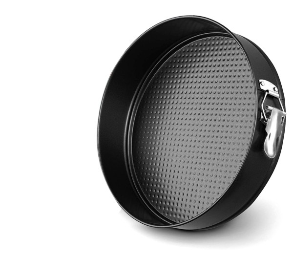 Moule pour la cuisson des gâteaux et boucle à ressort