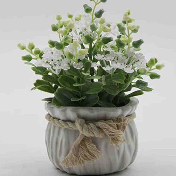 Lauren Taylor - Artificial Floral arrangements in a Pot