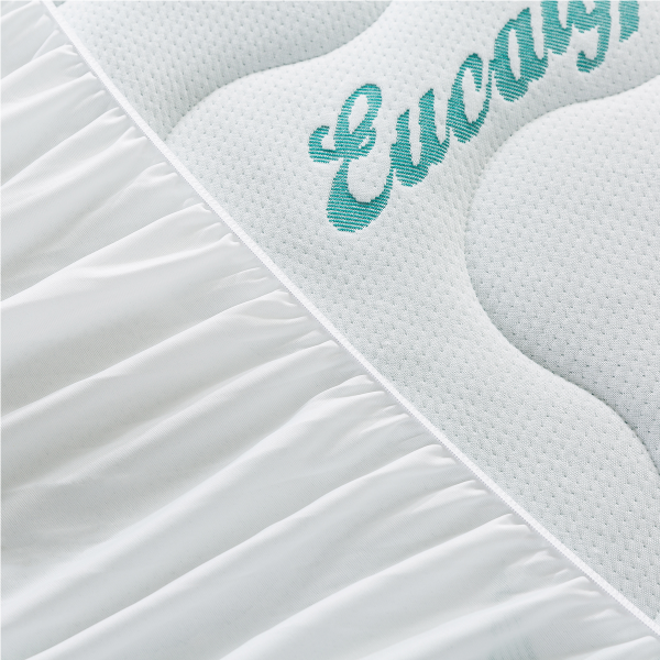 Couvre-matelas bleu sarcelle matelassé Eucalyptus