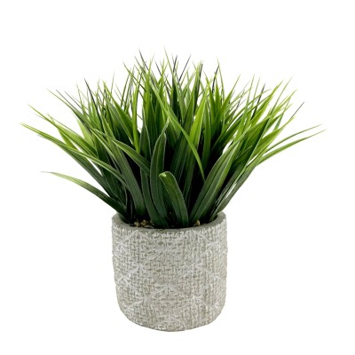 Plante artificielle dans un pot en ciment | motifs géométriques