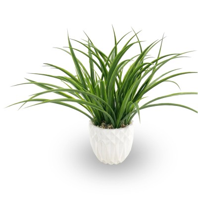 Plante artificielle dans un pot en céramique stylisé