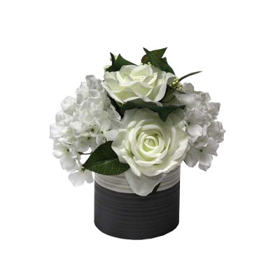 Fleur en tissu dans un pot en céramique