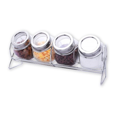 ​Un ensemble de 4 pots à épices et un support