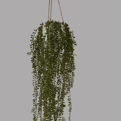 Perles artificielles suspendues dans un pot en céramique