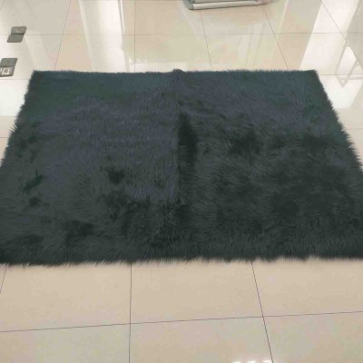 Tapis en fausse fourrure avec dos en tissu daim 120x180 cm