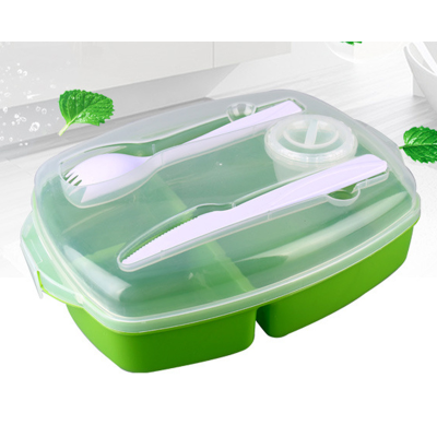 Compartemented lunch box with cutlery and dressing cup