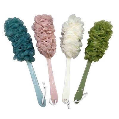 Brosse de bain avec manche en plastique